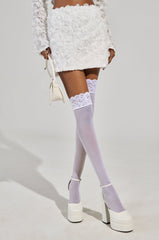 SWEET ESCAPE MINI SKIRT IN WHITE