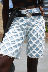 DISTRESSED AND STRESSED DENIM BERMUDA SHORT