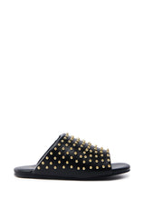 AKIRA BAGGER STUDDED SLIP ON SANDAL IN BLACK