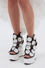 AZALEA WANG FLOWER EMBELLISHED WEDGE SANDAL IN BLACK