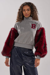 NEW EAST SIDE FAUX FUR SLEEVE SWEATSHIRT