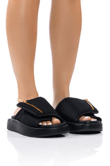 AZALEA WANG CALICO FLAT SLIP ON SANDAL IN BLACK