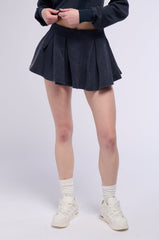 THINKING OF A PLACE PLEATED KNIT MINI SKIRT