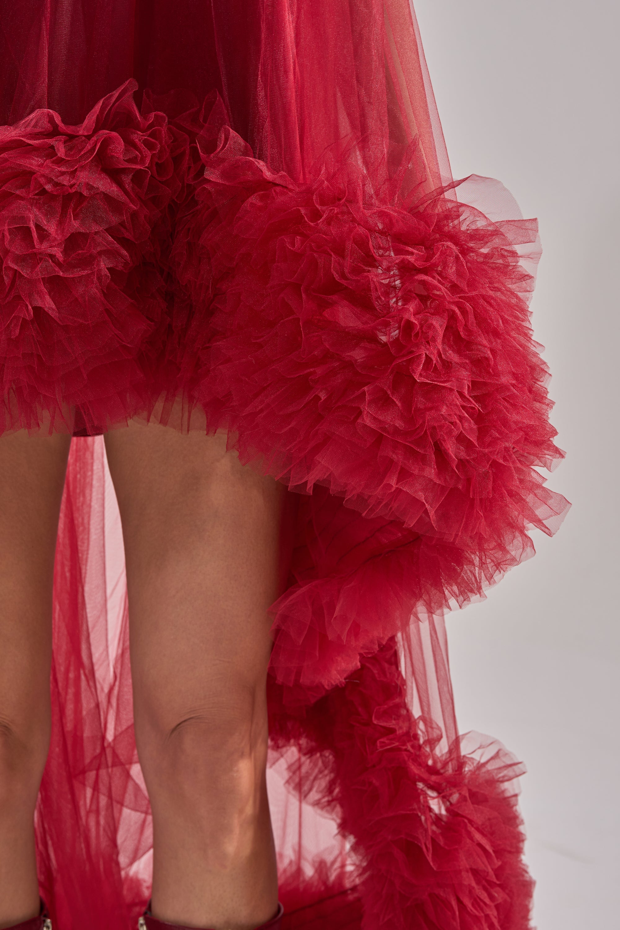 ARI TULLE HIGH LOW DRESS IN BURGUNDY