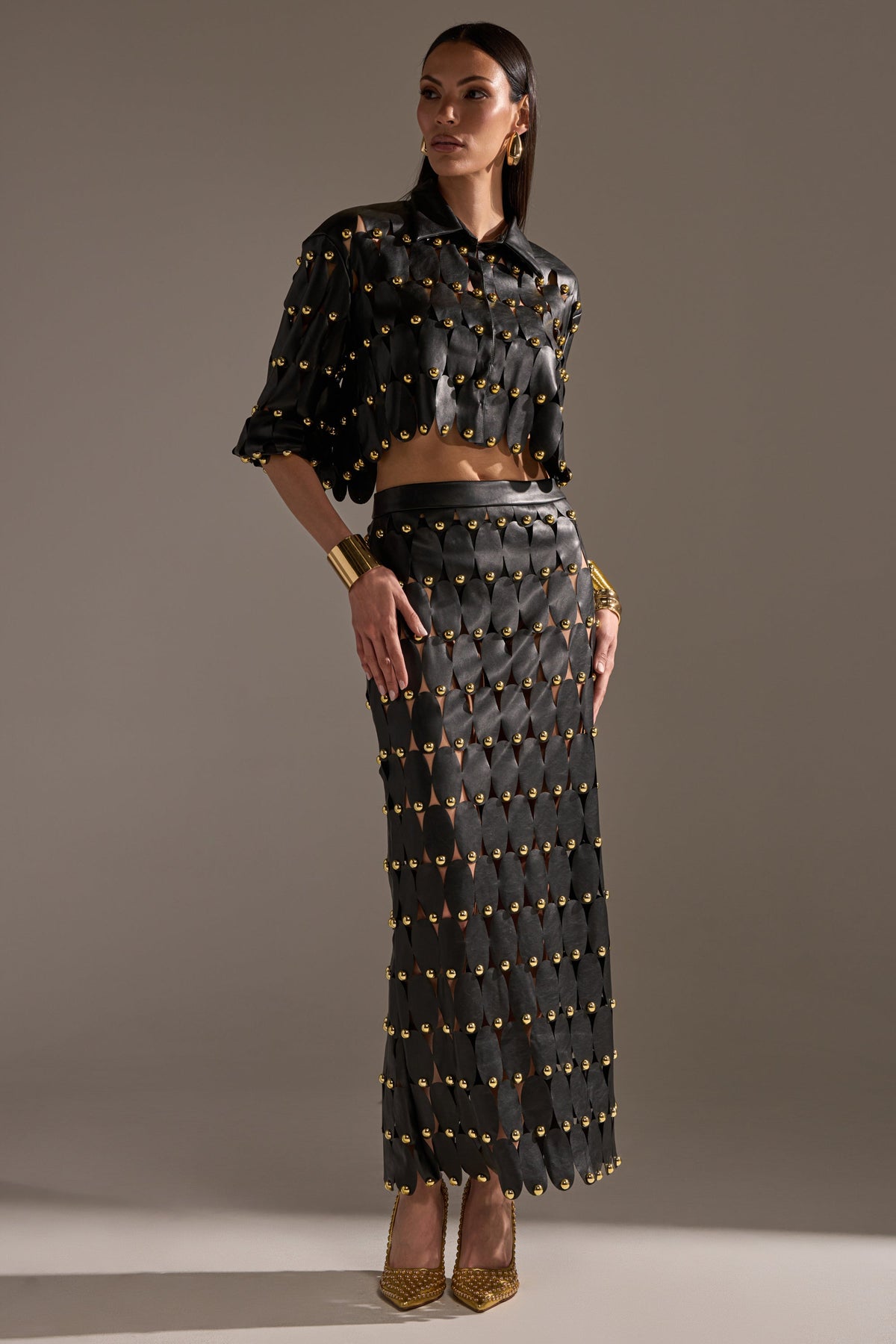 THE SNEAK PEEK STUDDED PU MIDI SKIRT IN BLACK