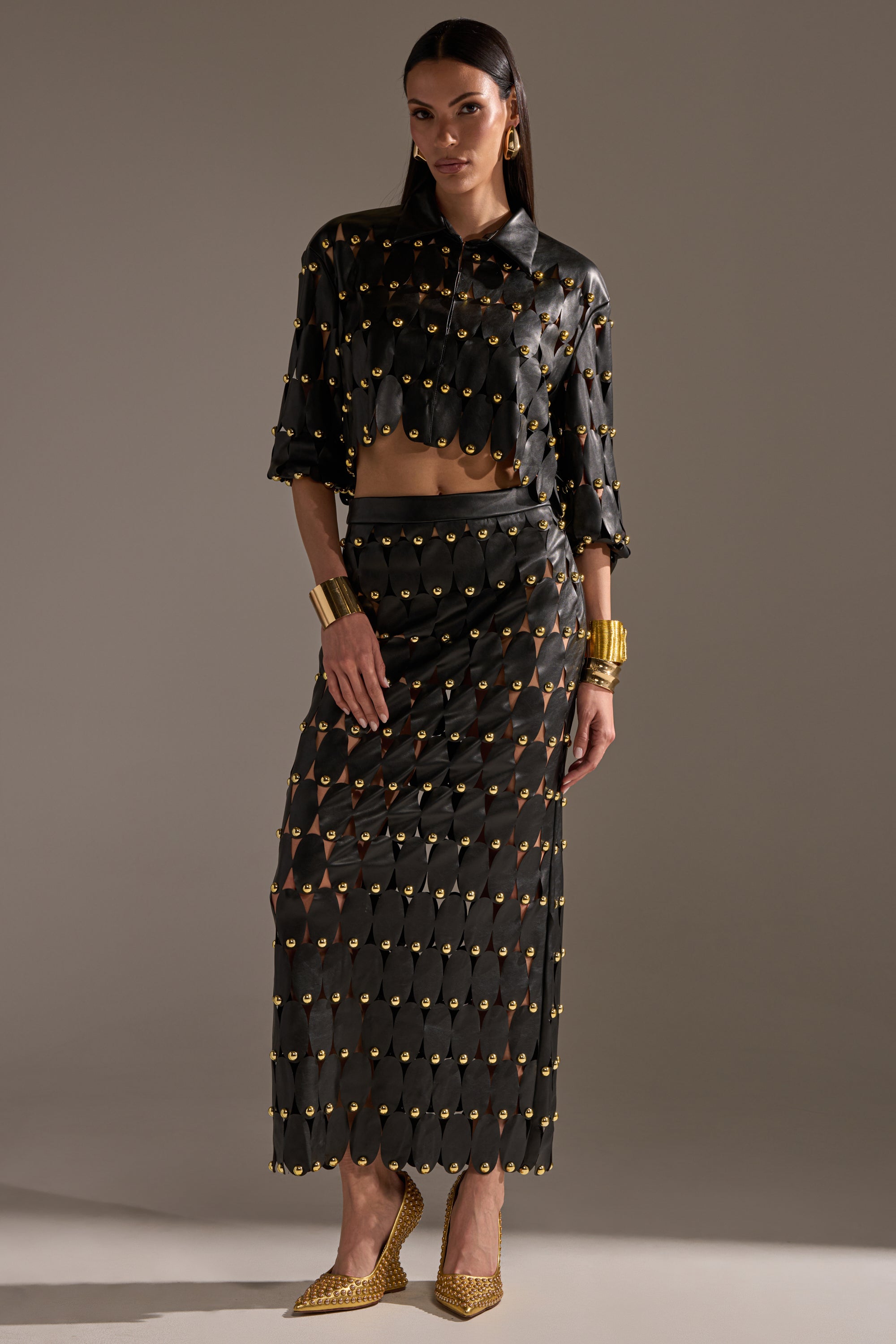THE SNEAK PEEK STUDDED PU MIDI SKIRT IN BLACK