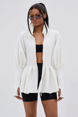 TWIN FLAME PEPLUM BOMBER IN WHITE