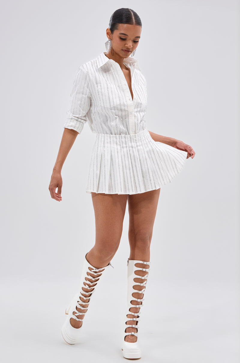 ONTO THE NEXT EMBELLISHED PLEATED MINI SKIRT IN WHITE
