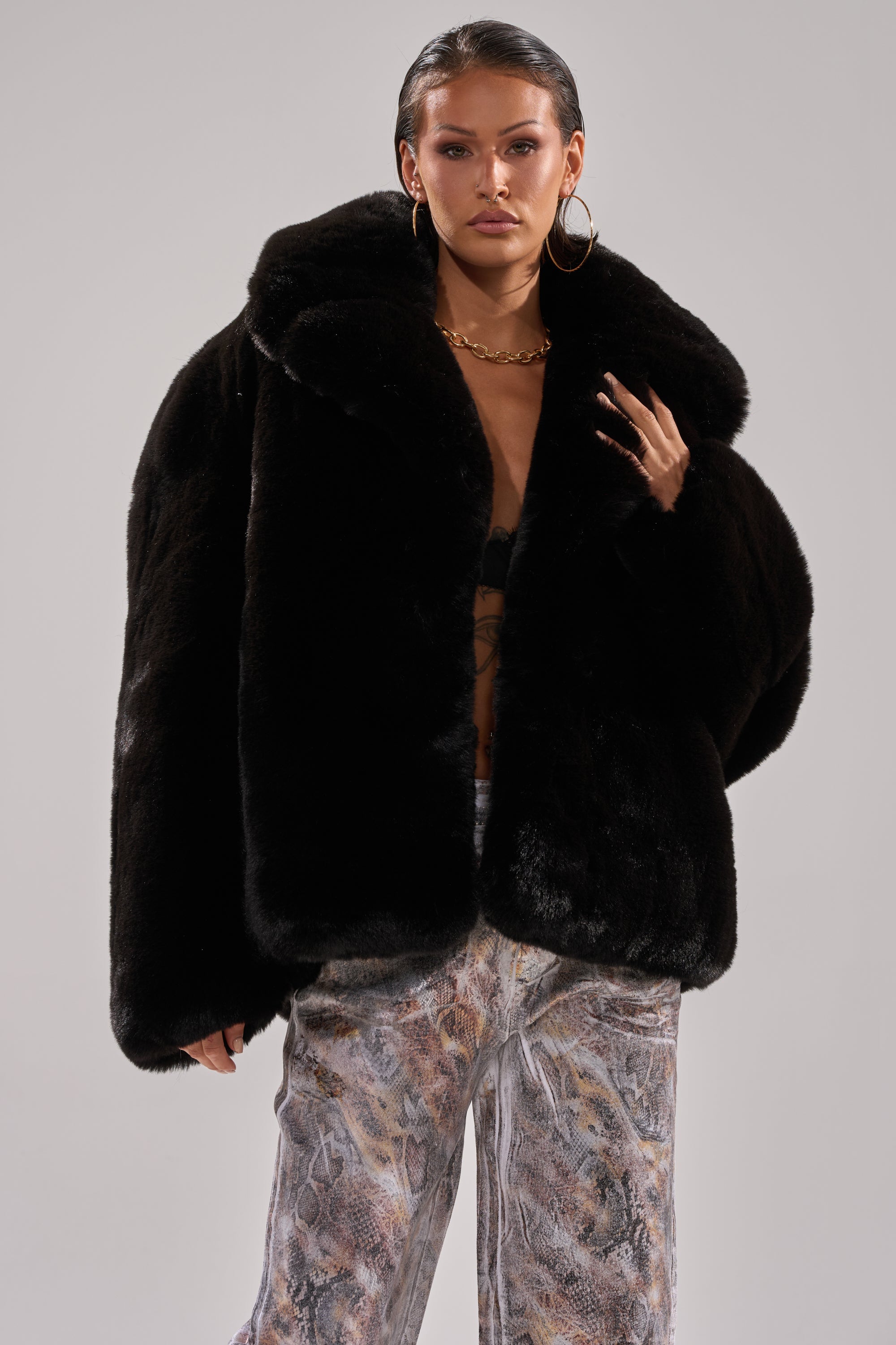NO LOOKING BACK FAUX FUR IN BLACK