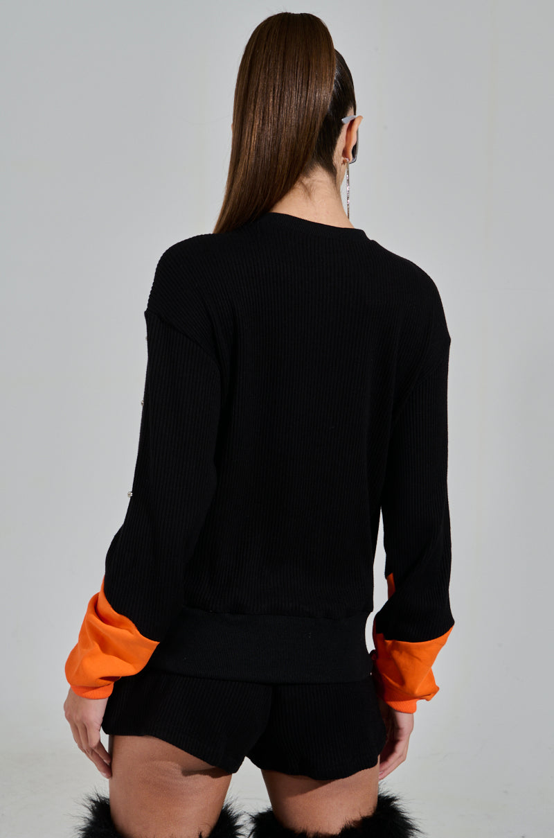 ASTRO MENACE SWEATER