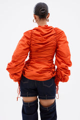 IN IT TO WIN IT RUCHED BLOUSE