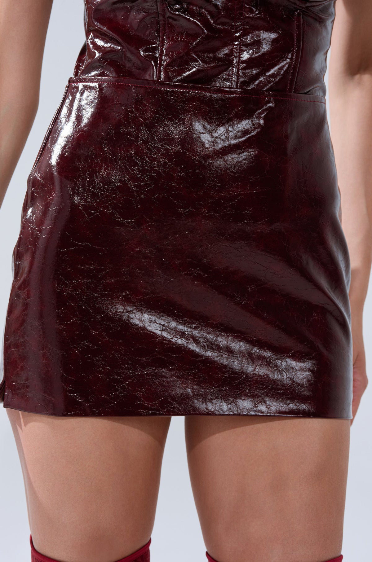 IM YOUR WEAKNESS FAUX LEATHER MINI SKIRT