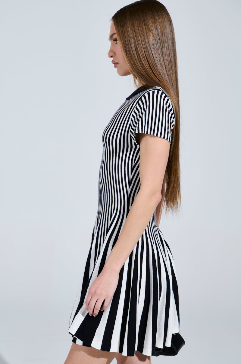 ALINA PLEATED KNIT FIT AND FLARE MINI DRESS IN BLACK AND WHITE