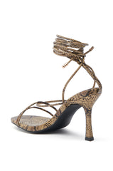 AKIRA HIGH TOWER NUDE SNAKE LACE UP SANDAL