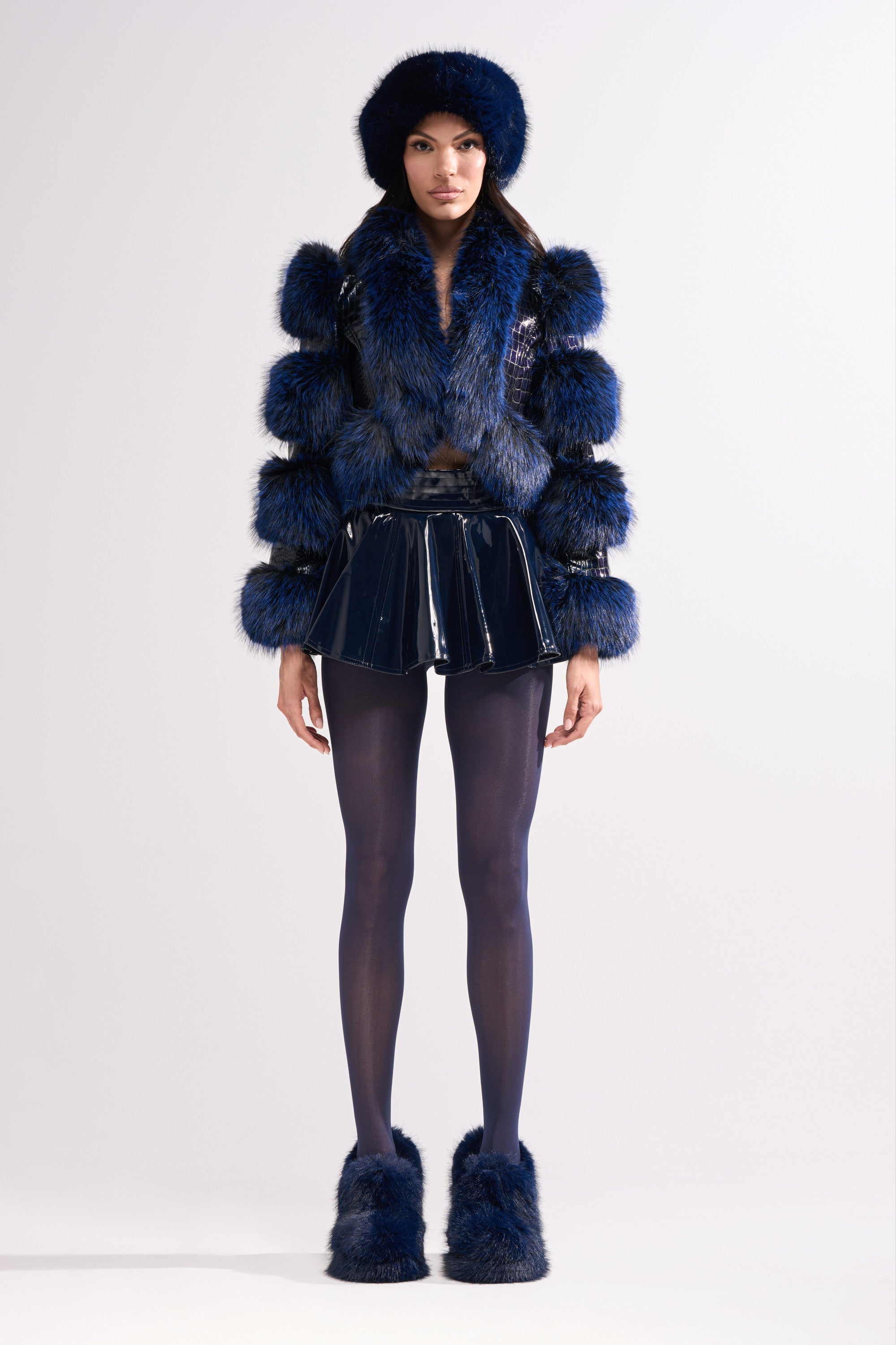 SHE IS ON FIRE FAUX LEATHER MINI SKIRT IN NAVY