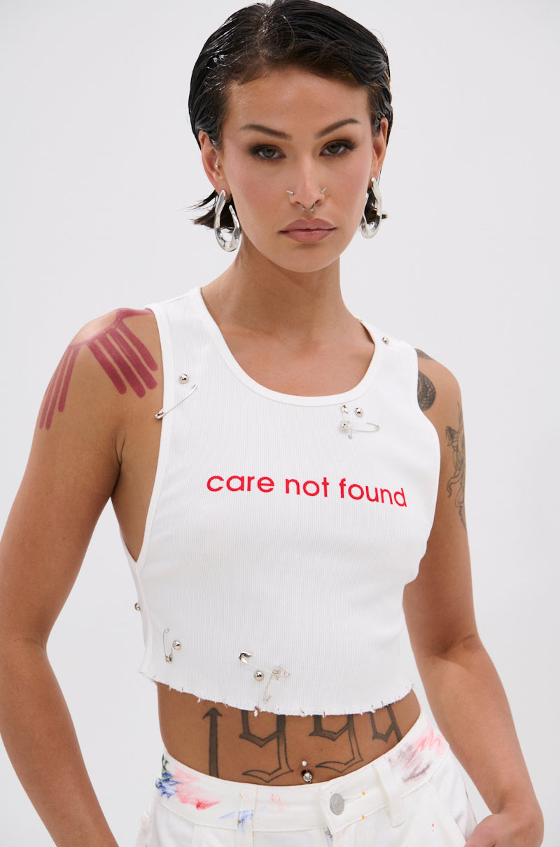 NEVER CARED DISTRESSED CROPPED TANK TOP