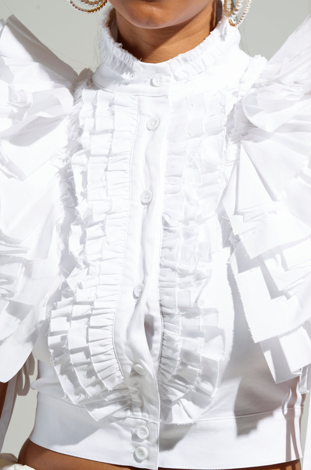 OVER AND OVER RUFFLE TOP