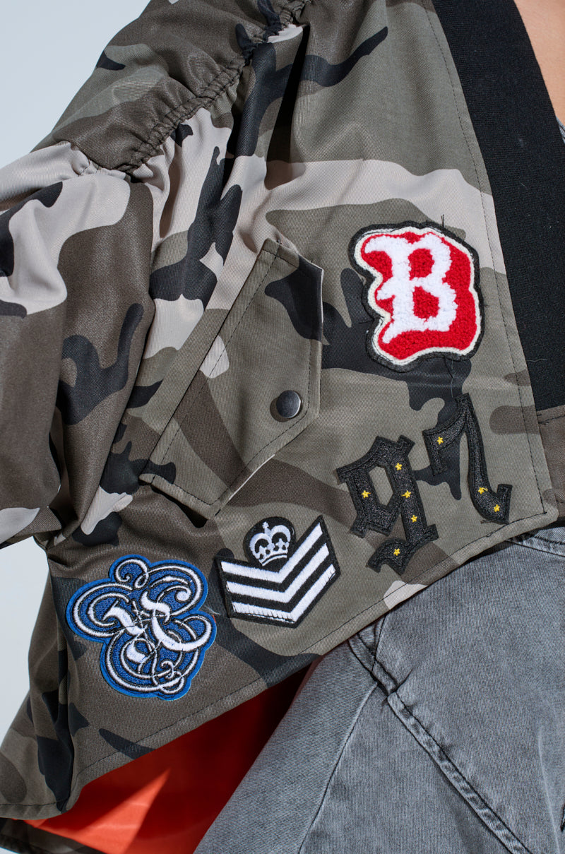 ON THE RUN CAMO SHRUG