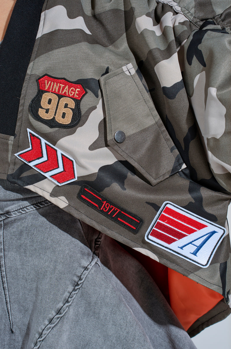 ON THE RUN CAMO SHRUG