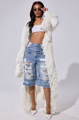 BURRR IT'S COLD OUTSIDE FRINGE OVERSIZED SWEATER IN IVORY