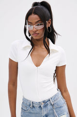 PAXTON FRONT ZIP SHORT SLEEVE COLLARED BODYSUIT