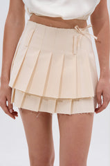 TRISHA PLEATED MINI SKIRT