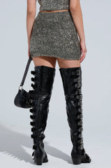 WRAPPED IN GOLD FITTED KNIT MINI SKIRT