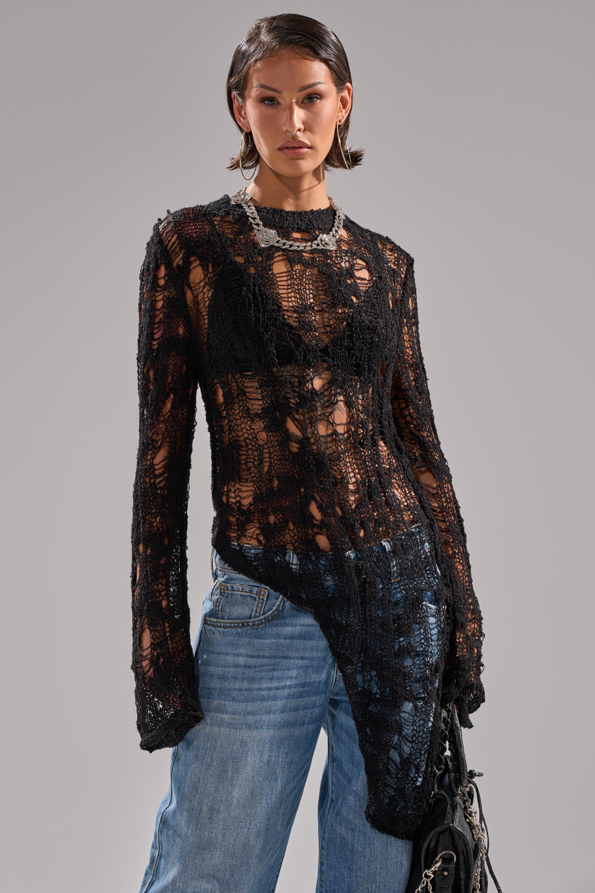 ASYMMETRICAL KNIT SWEATER