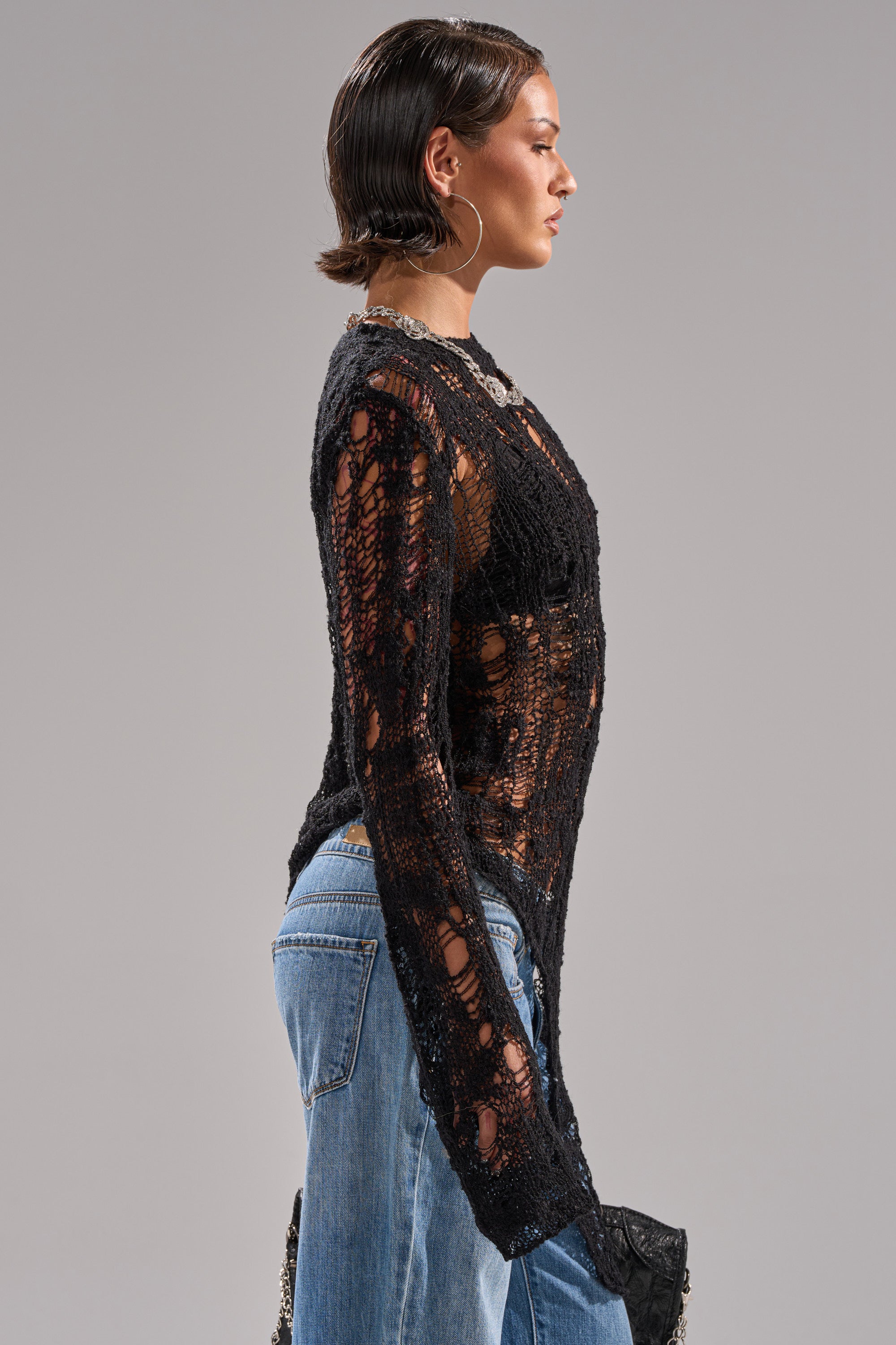 ASYMMETRICAL KNIT SWEATER