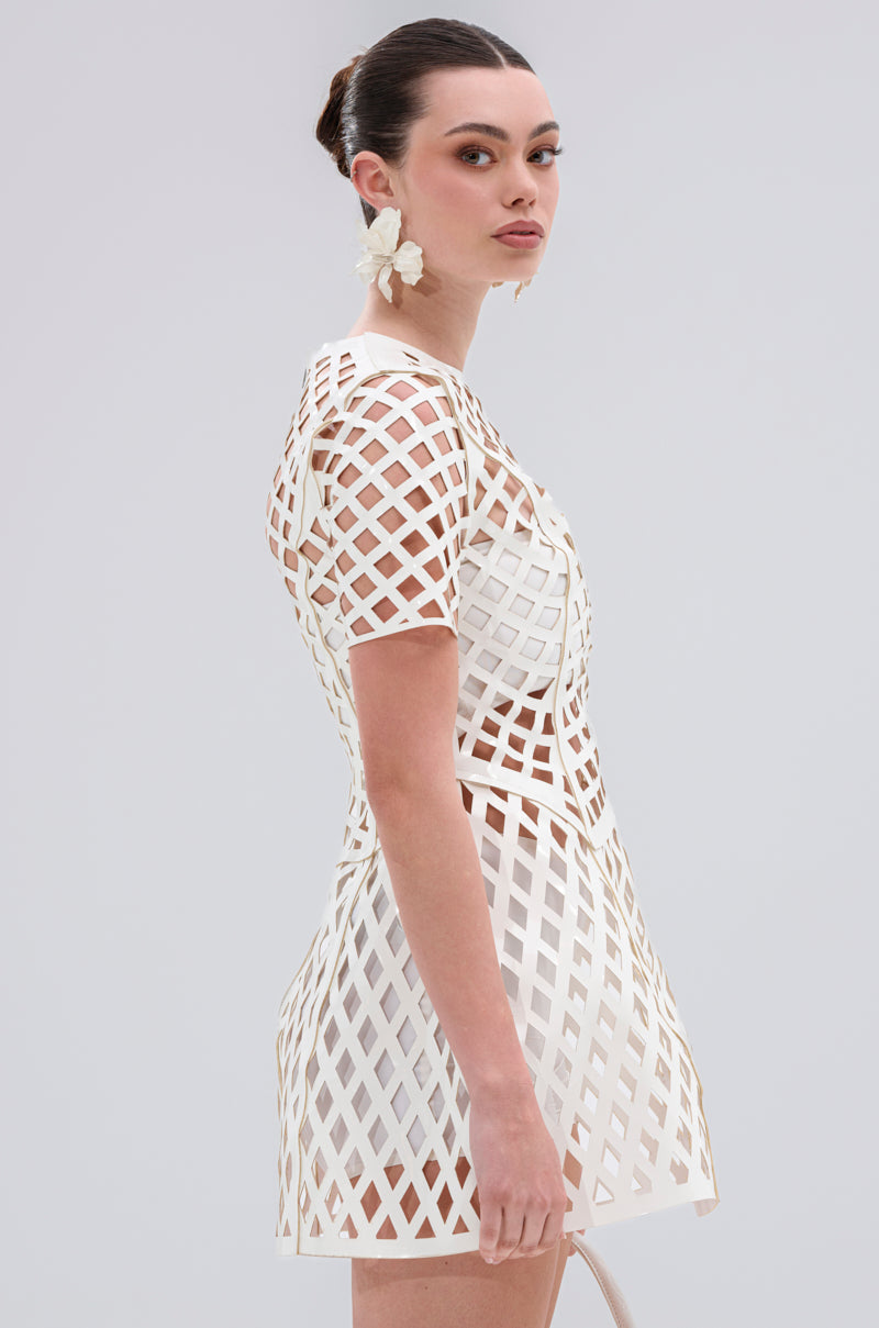 SHE'S DIFFERENT CUT OUT FAUX LEATHER MINI DRESS IN WHITE
