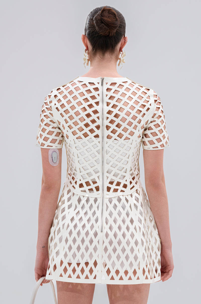 SHE'S DIFFERENT CUT OUT FAUX LEATHER MINI DRESS IN WHITE