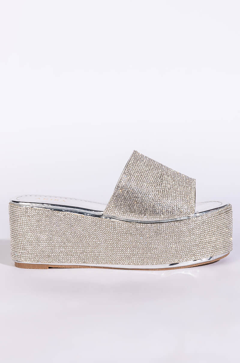 AND ANOTHER ONE SLIP ON FLATFORM SANDAL