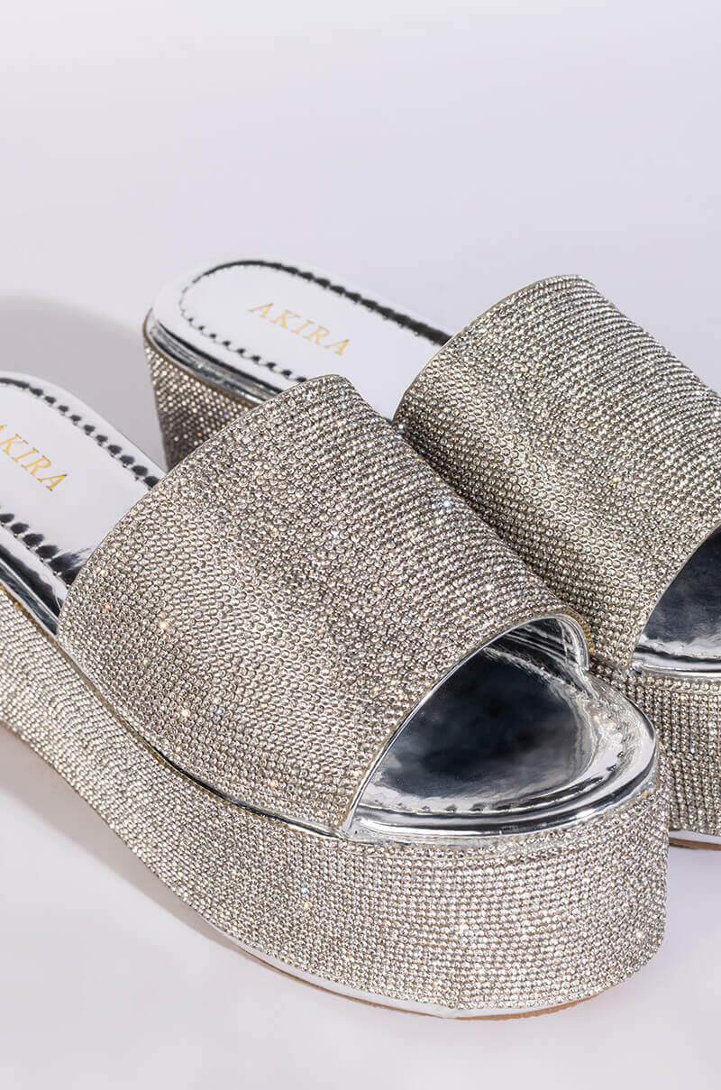 AND ANOTHER ONE SLIP ON FLATFORM SANDAL