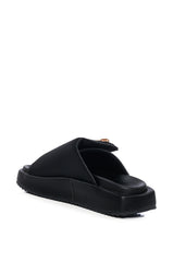 AZALEA WANG CALICO FLAT SLIP ON SANDAL IN BLACK