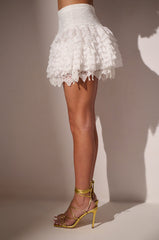 LOVE U ALWAYS RUFFLE MINI SKIRT IN WHITE