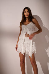 LOVE U ALWAYS RUFFLE MINI SKIRT IN WHITE