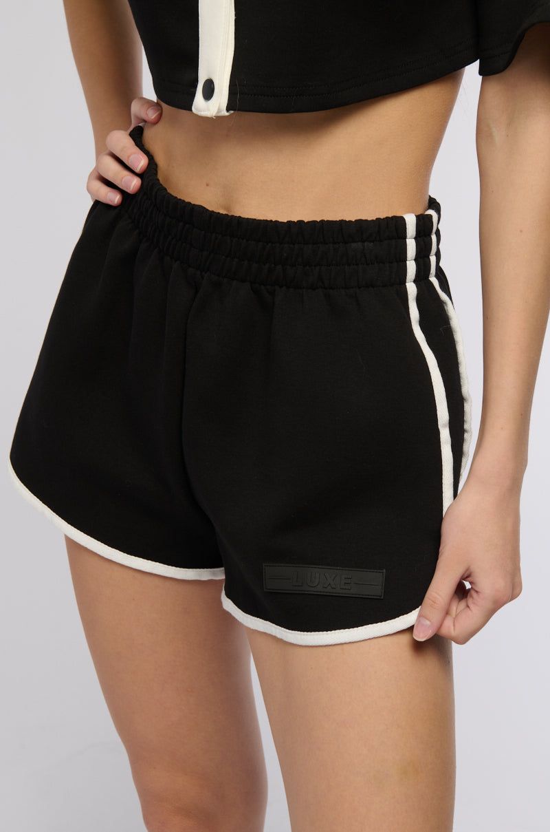 ON POINT STRIPED MINI SHORTS IN BLACK