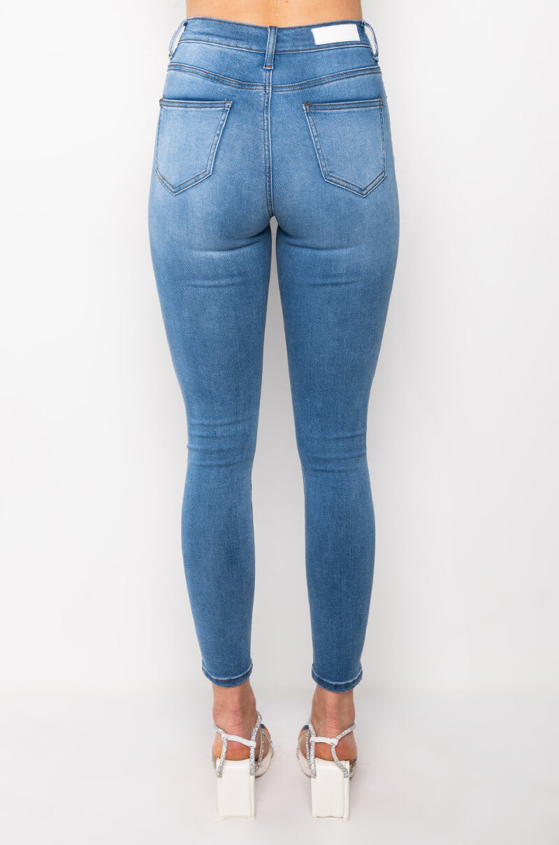 OUTTA THIS WORLD DISTRESSED RHINESTONE HIGH RISE SKINNY JEANS