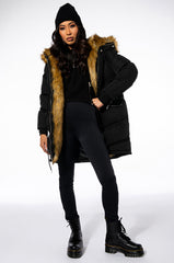 THE ULTIMATE LONG WINTER PUFFER WITH FAUX FUR
