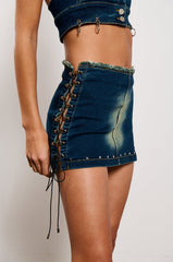 UNBOTHERED DISTRESSED DENIM MINI SKIRT