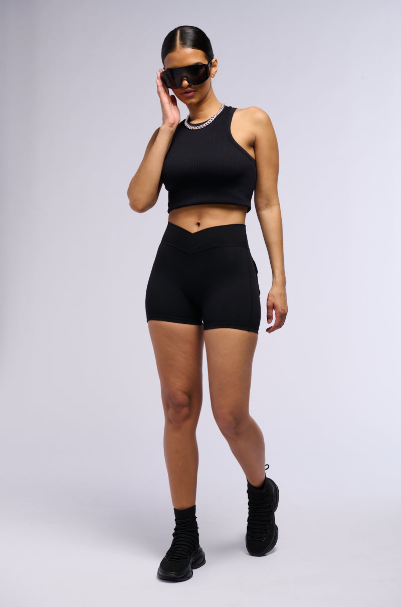 YOGA CROSS FRONT RUCHED BIKER SHORT IN BLACK